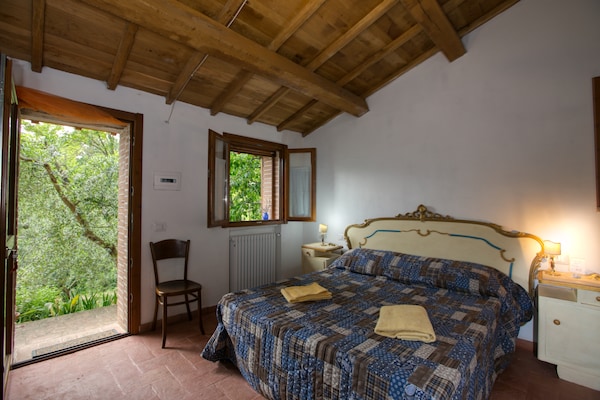 Foto van Vakantiehuis in Assisi met verwarmd zwembad - Vakantiehuis in Assisi - BedRoom