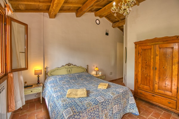 Foto van Vakantiehuis in Assisi met verwarmd zwembad - Vakantiehuis in Assisi - BedRoom