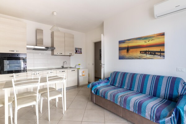 Foto van Appartement met terras en uitzicht op zee - Vakantiehuis in Castelsardo - LivingRoom