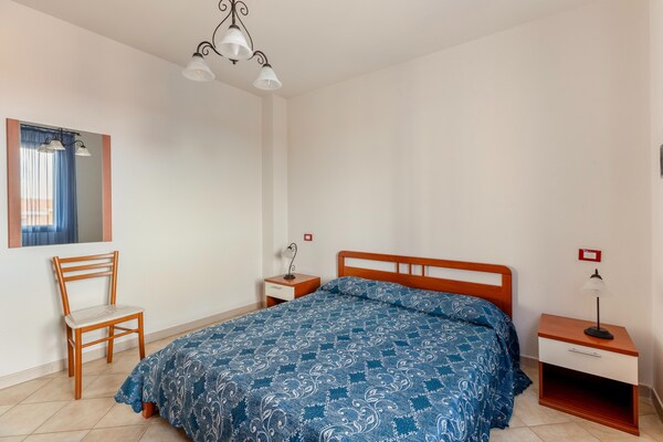 Foto van Appartement vlakbij zee, 2 zwembaden - Vakantiehuis in Valledoria - BedRoom