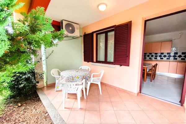 Foto van Appartement met zwembad en privéparkeerplaats - Vakantiehuis in Budoni - TerraceBalcony