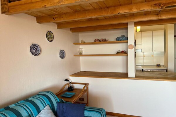 Foto van Residentie Porto Coda Cavallo in Sardinië - Vakantiehuis in San Teodoro - LivingRoom