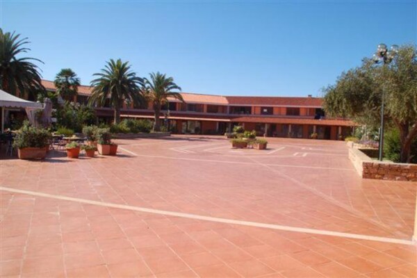 Foto van Residentie Porto Coda Cavallo in Sardinië - Vakantiehuis in San Teodoro - ExteriorSummer