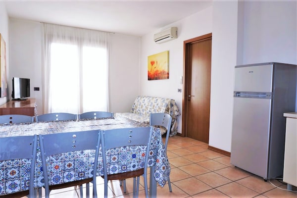 Foto van Ontspannend appartement in Caorle voor 7 personen - Vakantiehuis in Caorle (VE) - LivingRoom