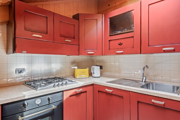 Foto van Charmant appartement in Trentino nabij een boomgaard - Kitchen