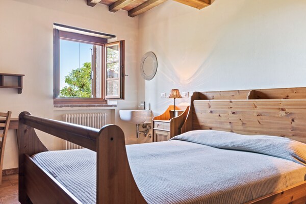Foto van Vakantiehuis Ca' De' Grimaldi met tuin - Vakantiehuis in Castellarano - BedRoom