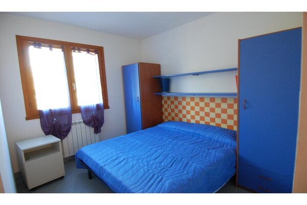 Foto van Familieverblijf in Rosolina Mare vlakbij zee - Vakantiehuis in Rosolina Mare RO - BedRoom