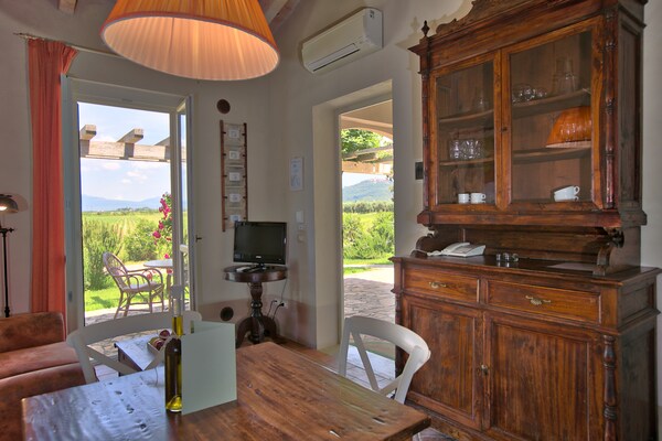 Foto van Vakantiehuis in Braccagni met Wellness & Golf - Vakantiehuis in Braccagni - LivingRoom