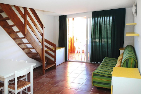 Foto van Appartement in Pinarellu bij Strand en Zwembad - Vakantiehuis in Marine de Pinarello - LivingRoom