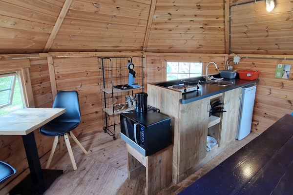 Foto van Bolderwagen voor kleine stelletjes aan het meer - Vakantiehuis in Almere - Kitchen