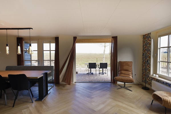 Foto van Villa in Wieringer Park met Tuin - Vakantiehuis in Hippolytushoef - LivingRoom