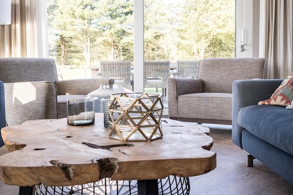 Foto van Moderne villa met een privéterras in De Cocksdorp - LivingRoom
