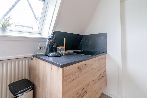 Foto van Comfortabel en modern ingericht 4-persoons appartement - LivingRoom