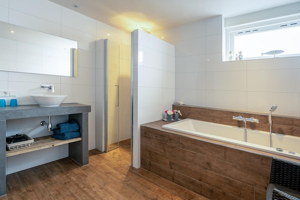 Foto van 2 persoons eilandzicht appartement met sauna - Vakantiehuis in De Koog - BathRoom