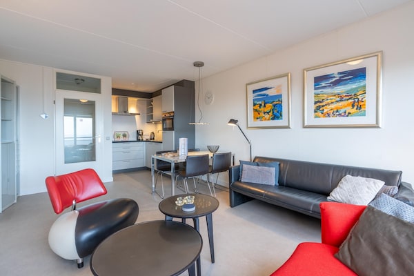 Foto van 4 Persoons appartement met zeezicht - Vakantiehuis in De Koog - LivingRoom