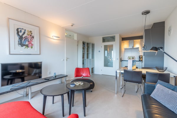Foto van 4 Persoons appartement met zeezicht - Vakantiehuis in De Koog - LivingRoom