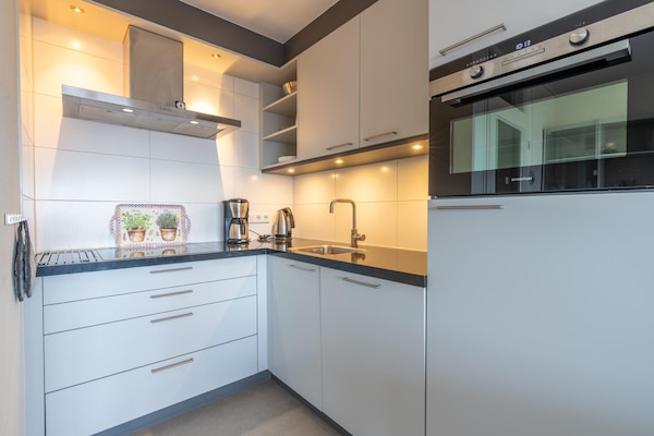 Foto van 4 Persoons appartement met zeezicht - Vakantiehuis in De Koog - Kitchen