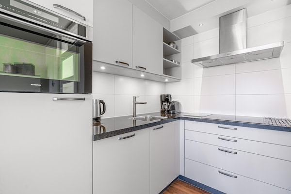 Foto van 4 Persoons appartement met zeezicht - Vakantiehuis in De Koog - Kitchen