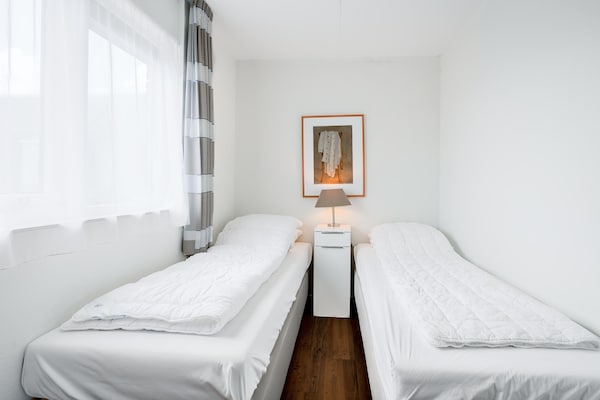 Foto van 4 Persoons appartement met zeezicht - Vakantiehuis in De Koog - BedRoom