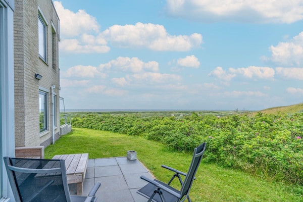 Foto van 2 persoons eiland-zeezicht studio-appartement - Vakantiehuis in De Koog - TerraceBalcony