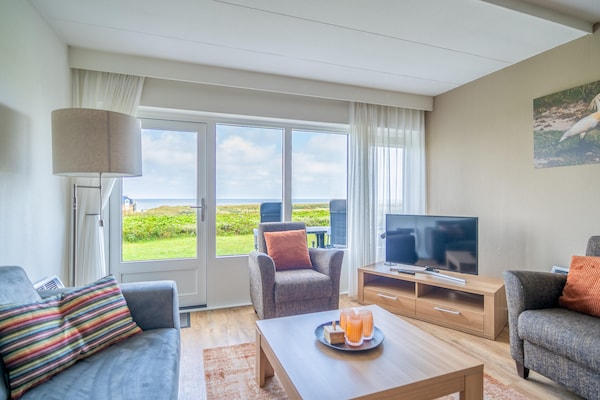 Foto van 4 Persoons appartement met zeezicht - Vakantiehuis in De Koog - LivingRoom
