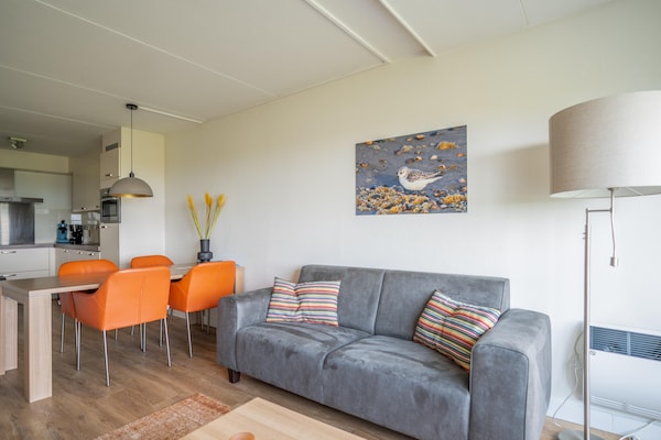 Foto van 4 Persoons appartement met zeezicht - Vakantiehuis in De Koog - LivingRoom