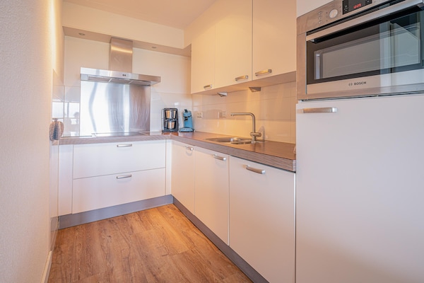 Foto van 4 Persoons appartement met zeezicht - Vakantiehuis in De Koog - Kitchen