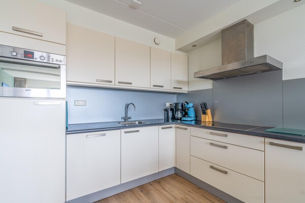 Foto van 4 Persoons appartement met eiland-zeezicht - Vakantiehuis in De Koog - Kitchen