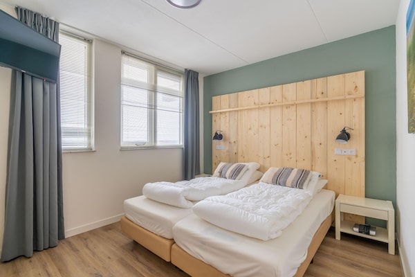 Foto van 4 Persoons appartement met eiland-zeezicht - Vakantiehuis in De Koog - BedRoom