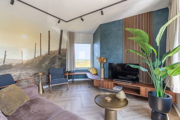 Foto van 4 Persoons appartement met eilandzicht - Vakantiehuis in De Koog - LivingRoom