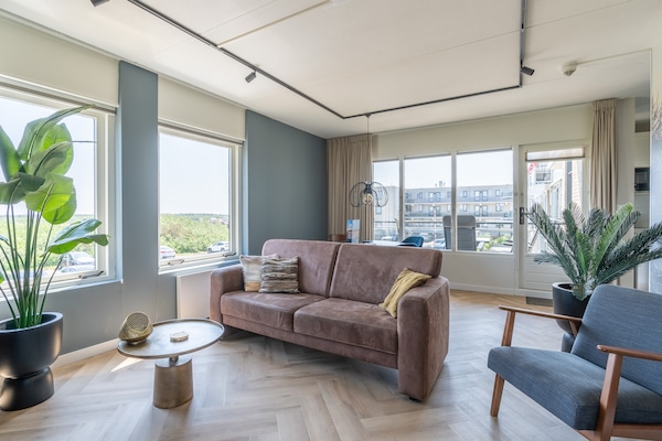 Foto van 4 Persoons appartement met eilandzicht - Vakantiehuis in De Koog - LivingRoom