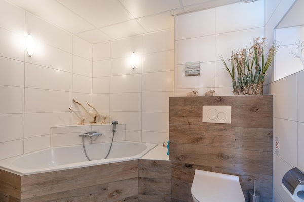 Foto van 2 Persoons appartement met zeezicht - Vakantiehuis in De Koog - BathRoom