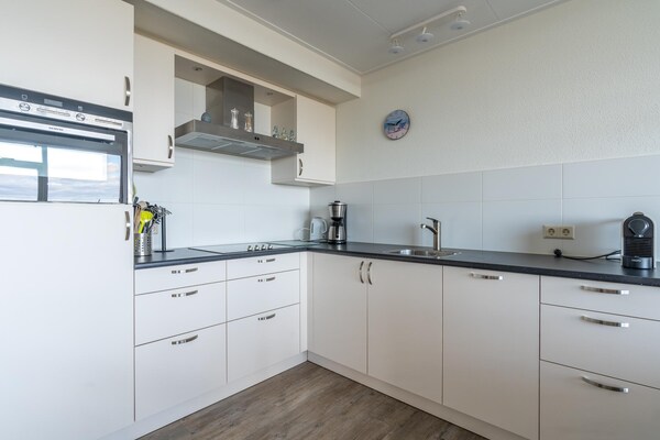Foto van 2 Persoons appartement met zeezicht - Vakantiehuis in De Koog - Kitchen