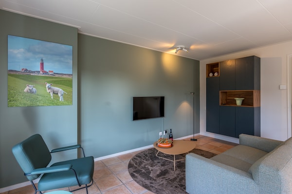 Foto van Bungalow voor 4 personen nabij de duinen van Texel - LivingRoom