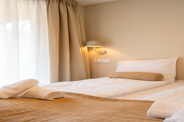 Foto van Waterlodge in Nederland met Terras - Vakantiehuis in Zeewolde - BedRoom