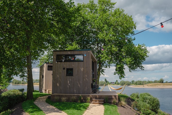 Foto van Tiny House aan Nederlands Water - Vakantiehuis in Maurik - Untagged