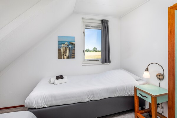 Foto van Villa in Aquadelta met Kindvriendelijke Details - Vakantiehuis in Bruinisse - LivingRoom