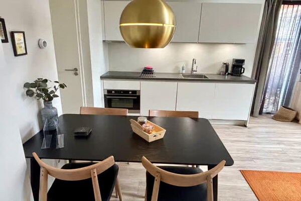 Foto van Gezellige 4-persoons lodge in tiny house stijl. - Vakantiehuis in Zoutelande - Kitchen