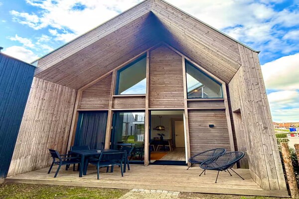 Foto van Gezellige 4-persoons lodge in tiny house stijl. - Vakantiehuis in Zoutelande - TerraceBalcony