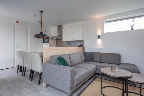 Foto van Lodge in Nieuwvliet Bad bij het Strand - Vakantiehuis in Nieuwvliet-Bad - LivingRoom