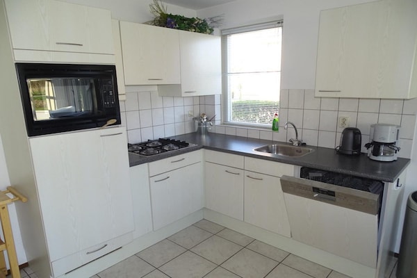 Foto van Bungalow in Breskens bij Strand en Vuurtoren - Vakantiehuis in Breskens - Ambiance