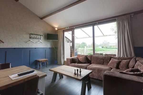 Foto van Gezellig comfortabel vakantiehuis bij de boer in Horssen met een tuin - LivingRoom
