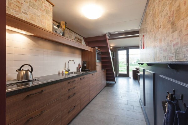 Foto van Gezellig comfortabel vakantiehuis bij de boer in Horssen met een tuin - Kitchen