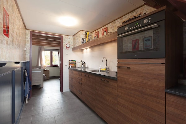 Foto van Gezellig comfortabel vakantiehuis bij de boer in Horssen met een tuin - Kitchen