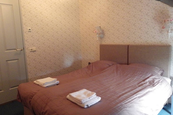 Foto van Gezellig comfortabel vakantiehuis bij de boer in Horssen met een tuin - BedRoom