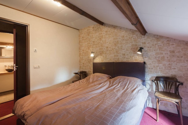 Foto van Gezellig comfortabel vakantiehuis bij de boer in Horssen met een tuin - BedRoom