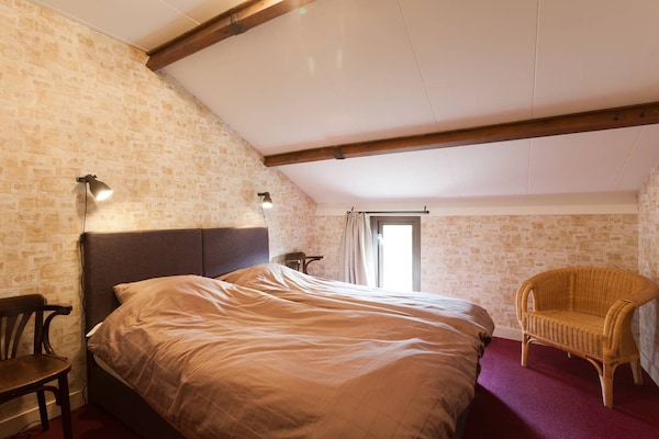 Foto van Gezellig comfortabel vakantiehuis bij de boer in Horssen met een tuin - BedRoom