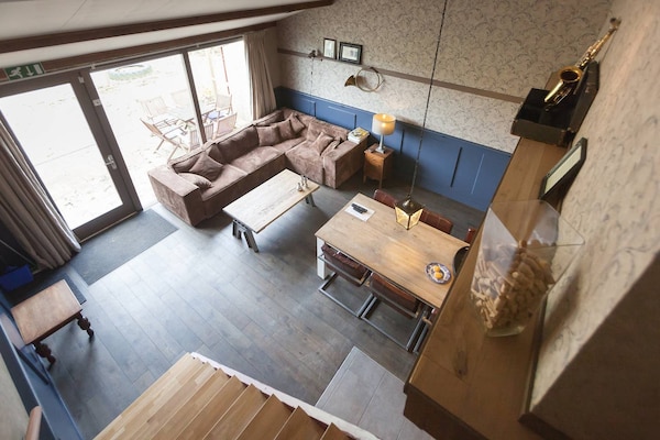 Foto van Gezellig comfortabel vakantiehuis bij de boer in Horssen met een tuin - LivingRoom