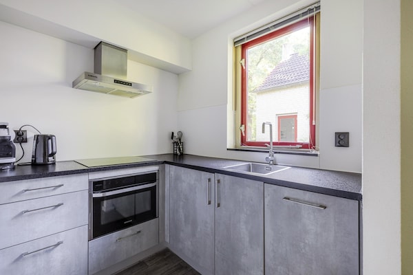 Foto van Saunabungalow aan het meer voor 4 - Vakantiehuis in Ewijk - Kitchen