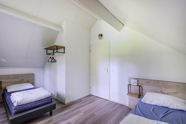 Foto van Saunabungalow aan het meer voor 4 - Vakantiehuis in Ewijk - BedRoom